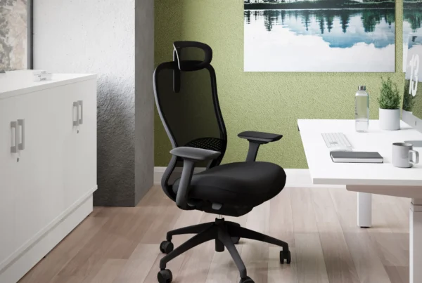 A small, bright office interior designed with the 60/40 rule showcasing a colourful feature wall